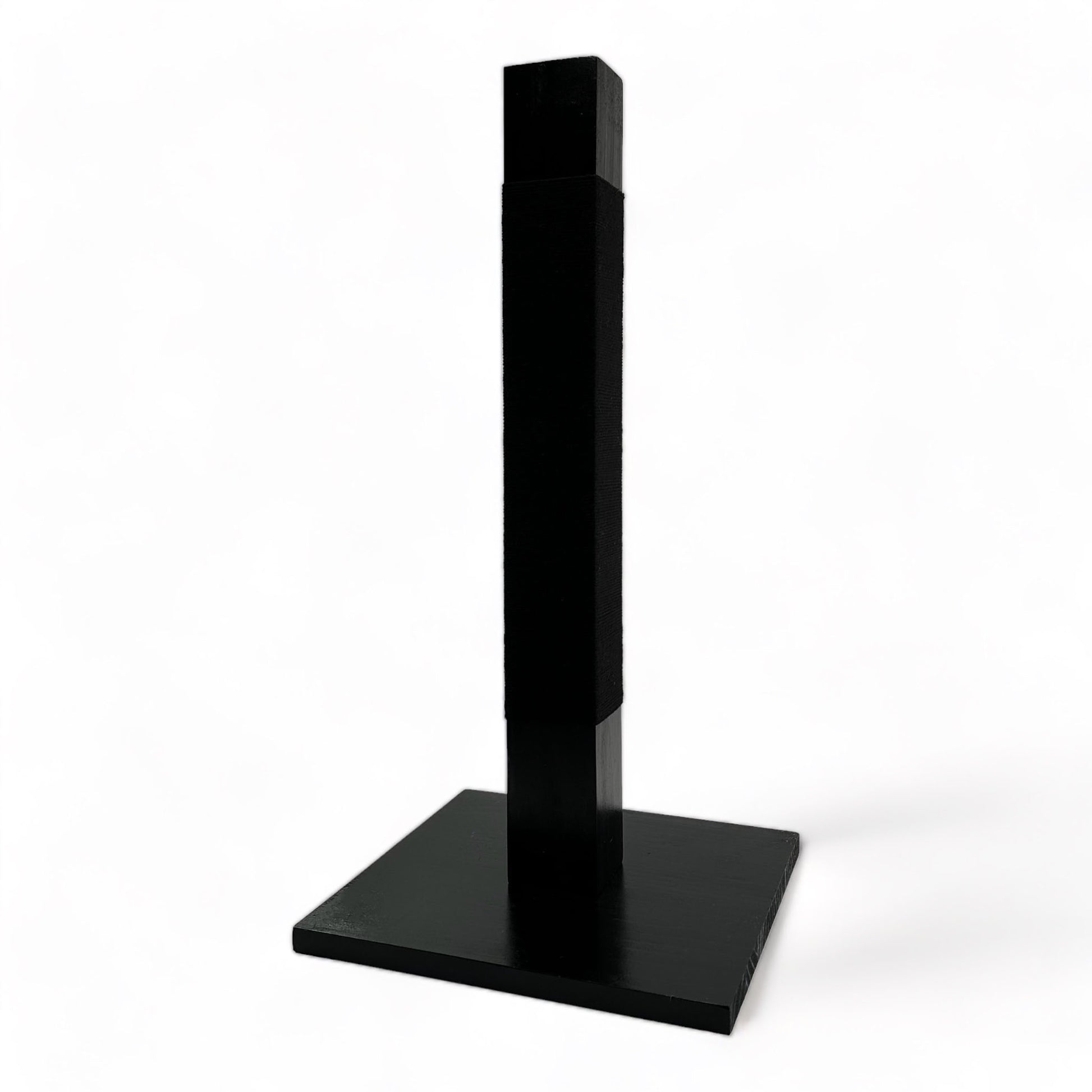 Side angle of black reusable solid wood cat scratching post looped in black cotton cord 