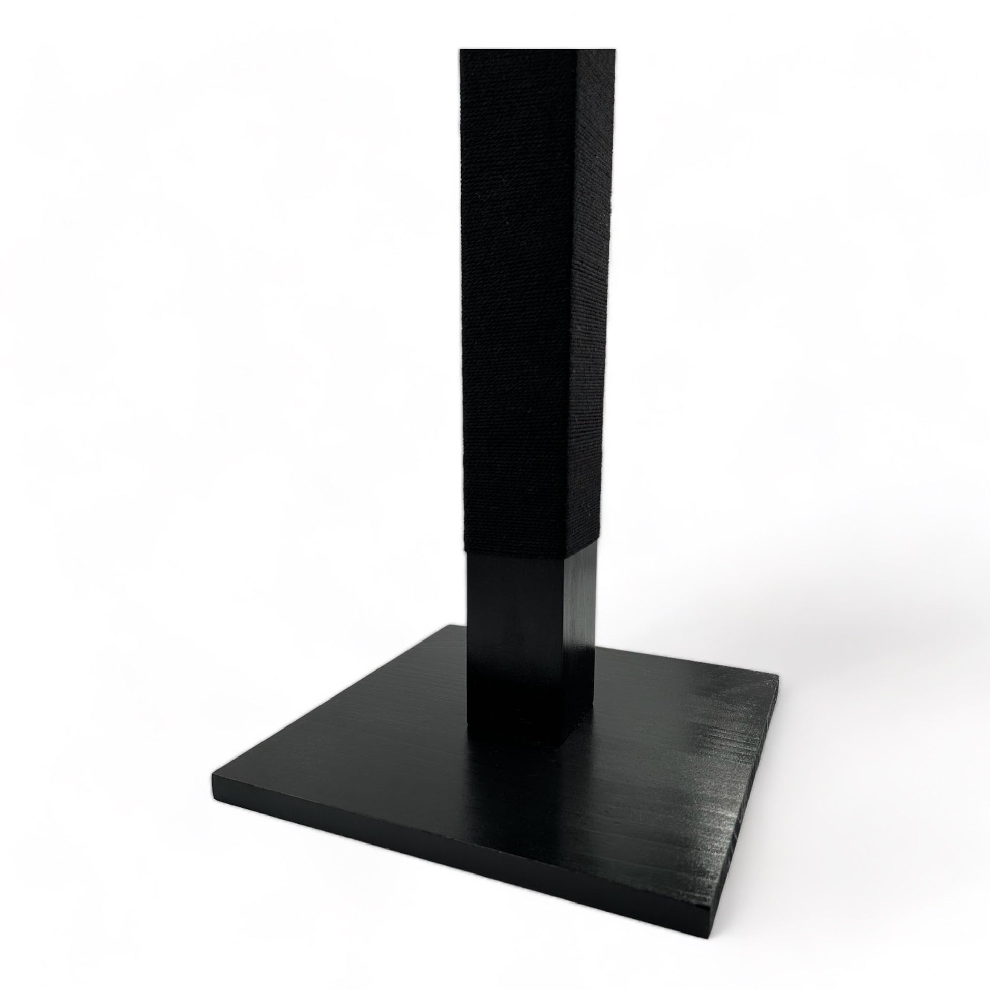 Bottom half of black reusable solid wood cat scratching post looped in black cotton cord 