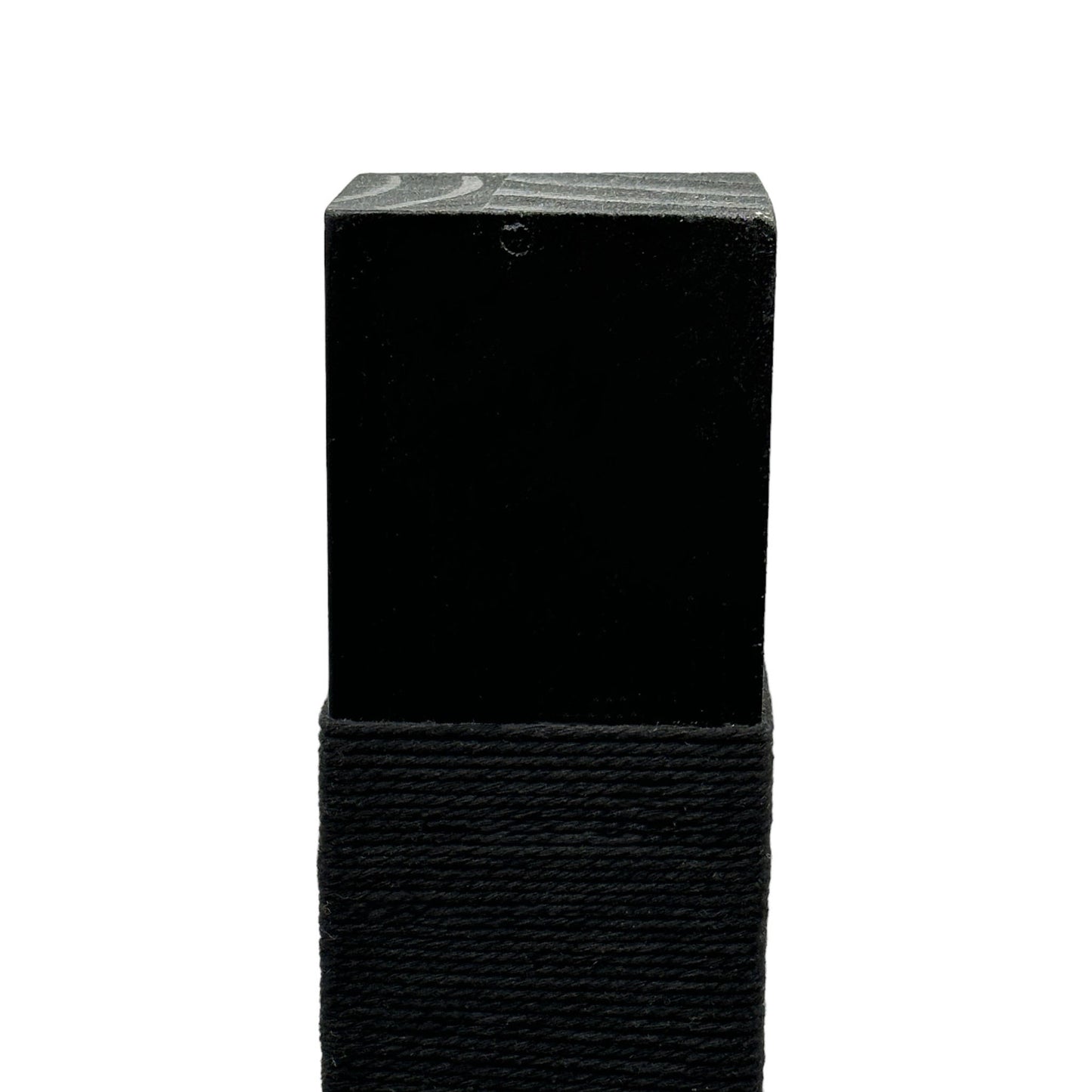 Top close up of black reusable solid wood cat scratching post looped in black cotton cord 