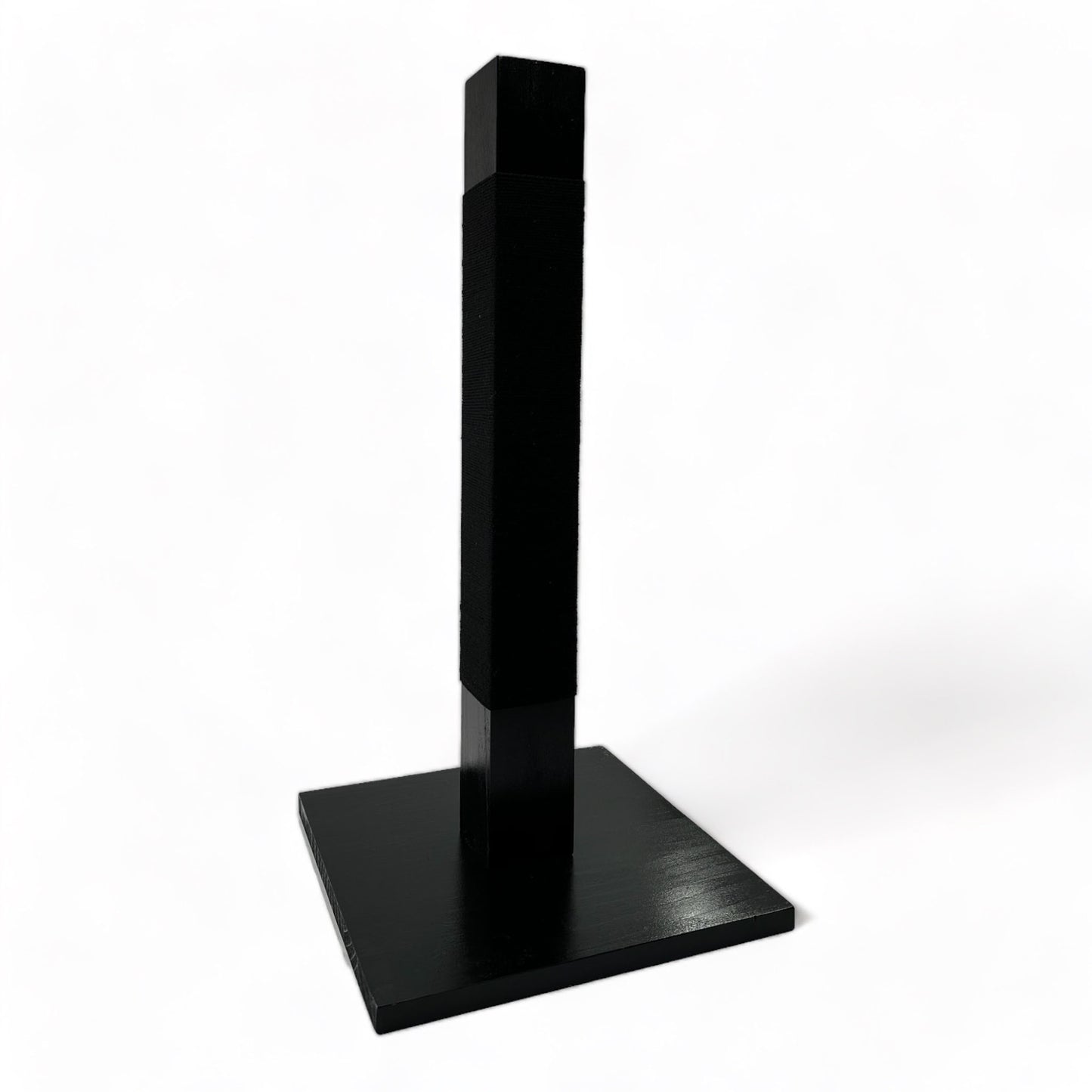 Side angle of reusable solid wood cat scratching post looped in black cotton cord 