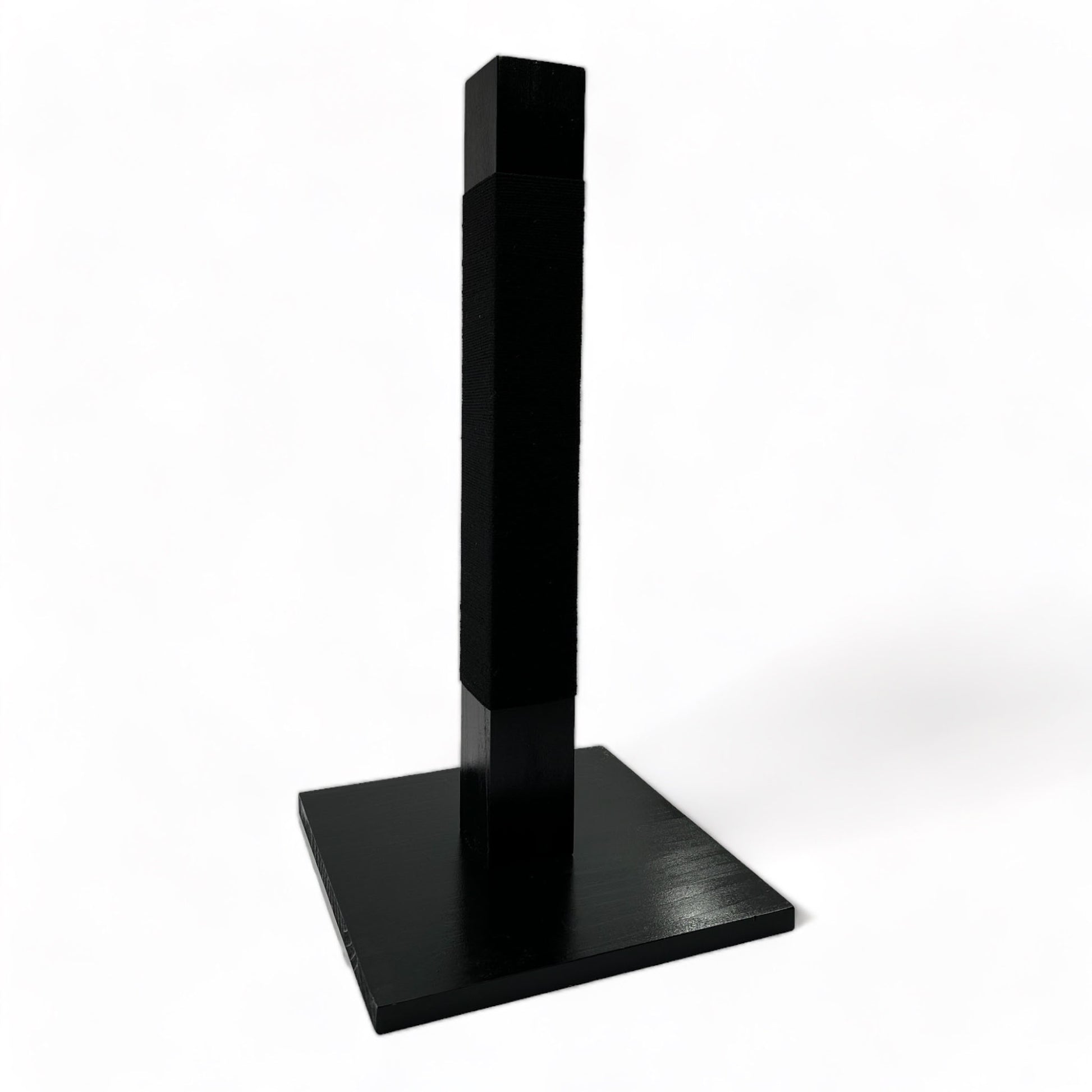 Side angle of reusable solid wood cat scratching post looped in black cotton cord 